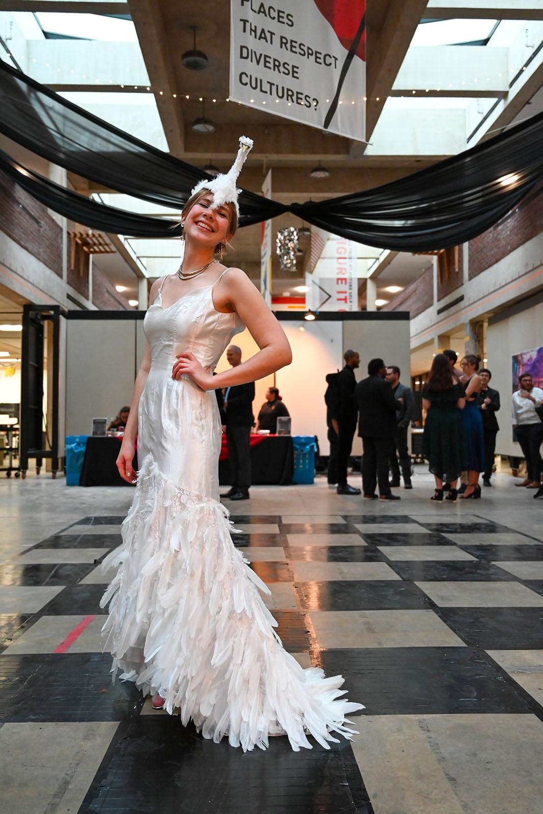 Woman in a white swan dress