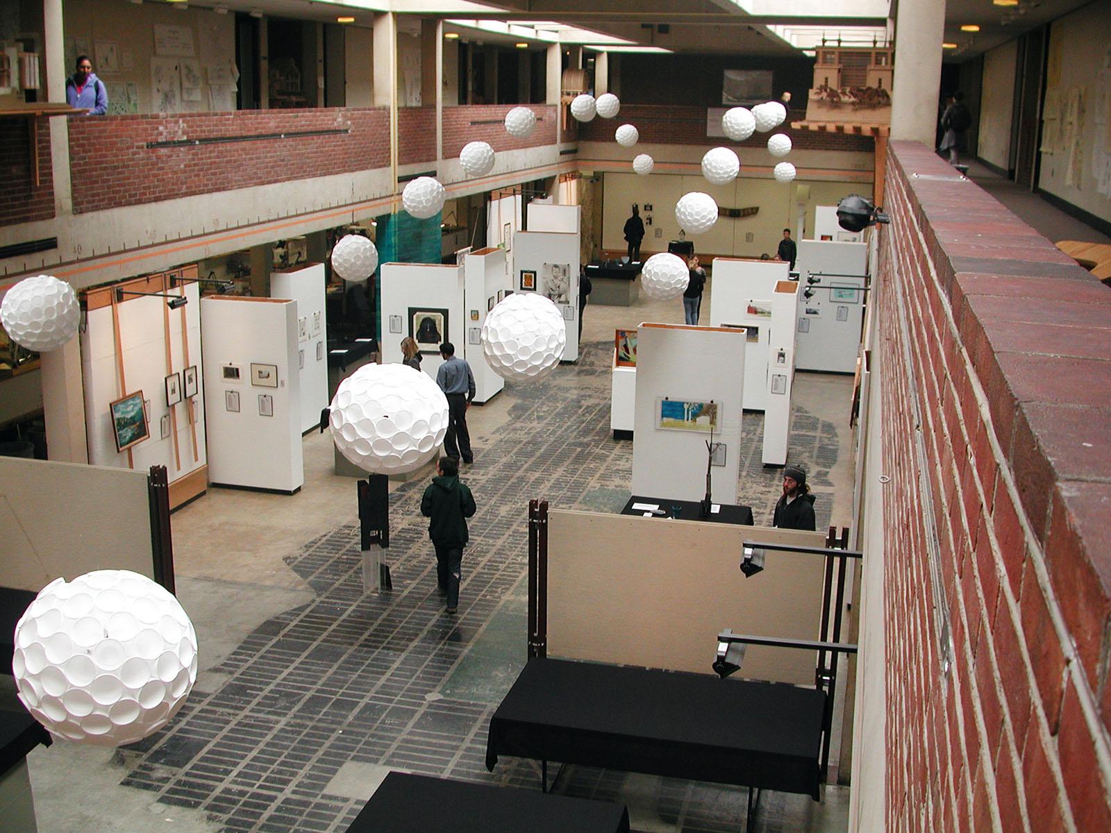 A city grid on the ground of the Great Space, which paper balloons hanging.