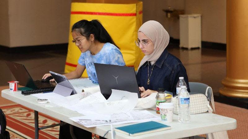 Heyam Abualrub working on the group project