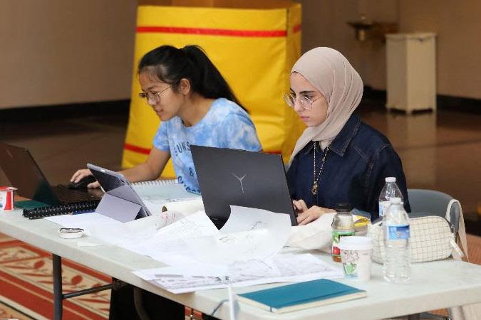 Heyam Abualrub working on the group project
