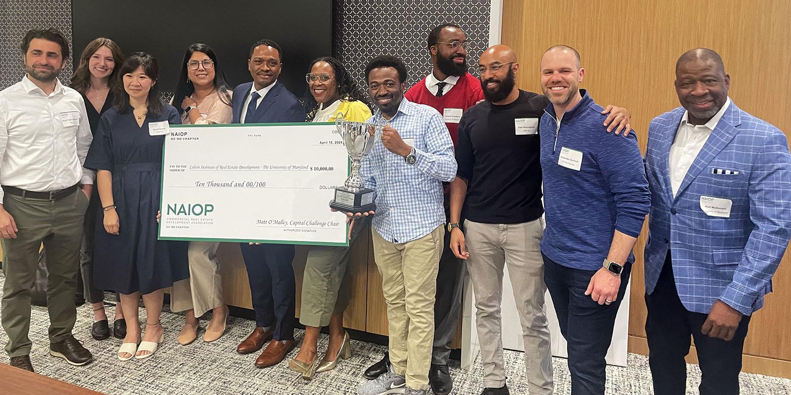 NAIOP winners holding a large check