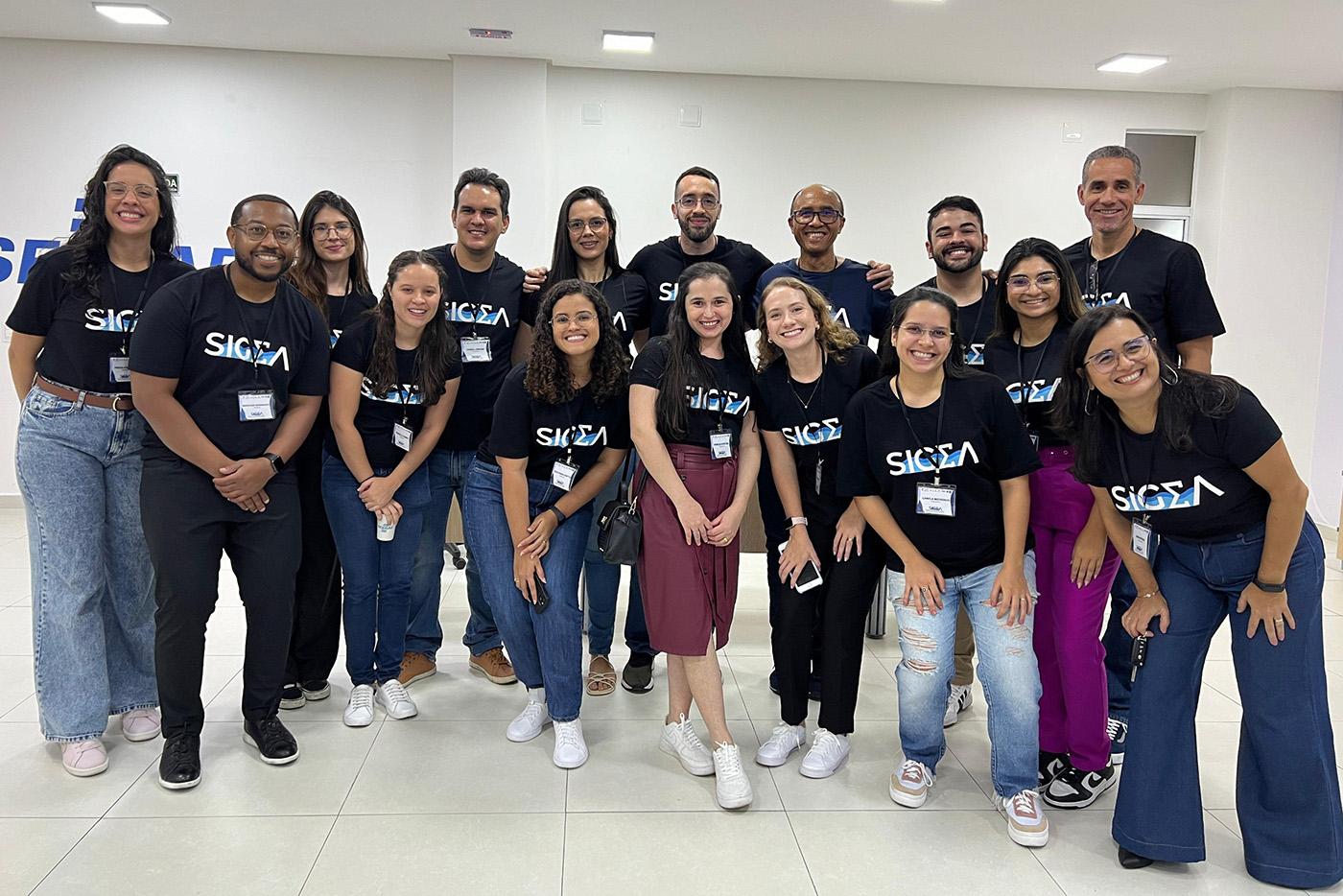 SIR and SIGMA team members all wearing the same black SIGMA shirt