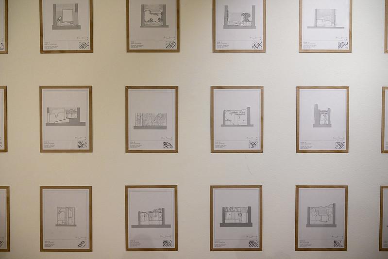 Numerous framed sketches