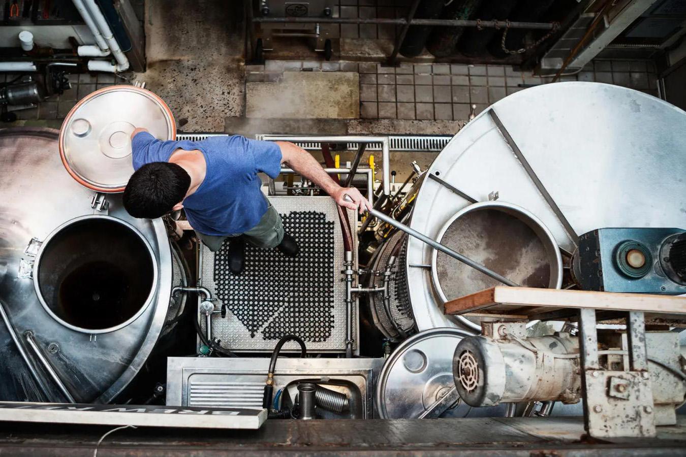 Birds eye view of man working in a brewery