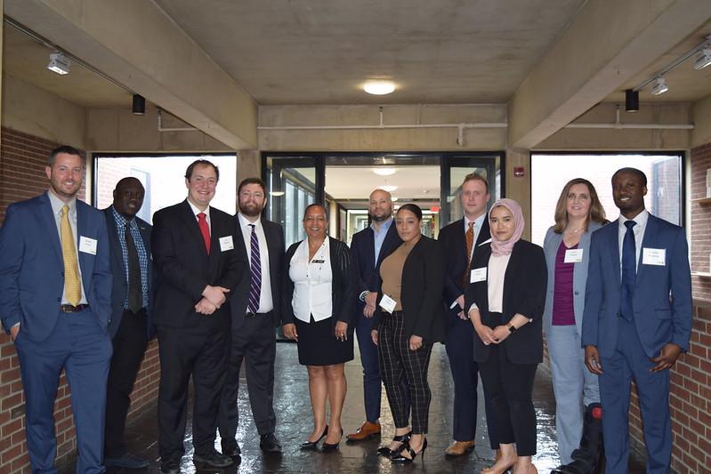 Colvin Capstone students posing with the Director