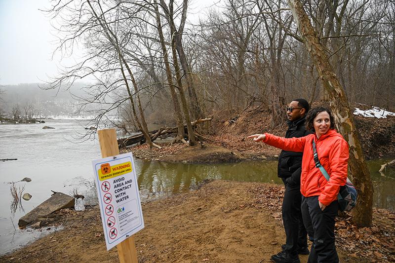 Marccus Hendricks and Rachel Goldstein by the Potomac water spillage