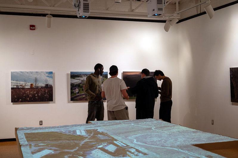 Students attending the Kibel Gallery Exhibit "In the Shadow of the Cloud"