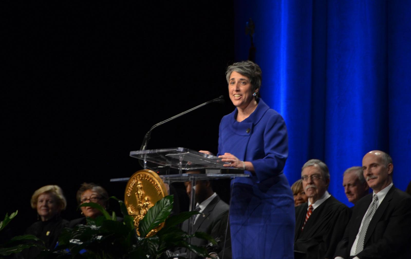 Elissa Silverman speaking at a podium at city council meeting 