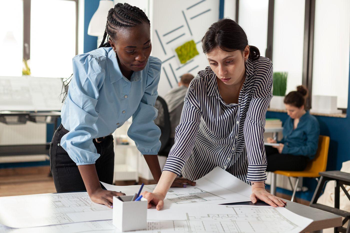 Talking, planning and business people in training for leadership and mentoring