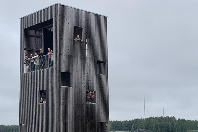 Dark grey, tall and rectangular Scandinavian building