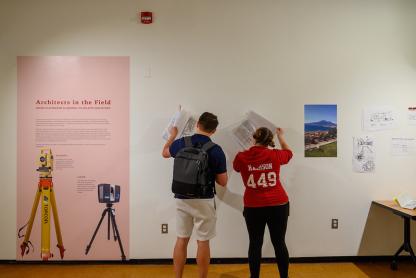 People looking at drawings at the Stabiae Kibel Gallery exhibit